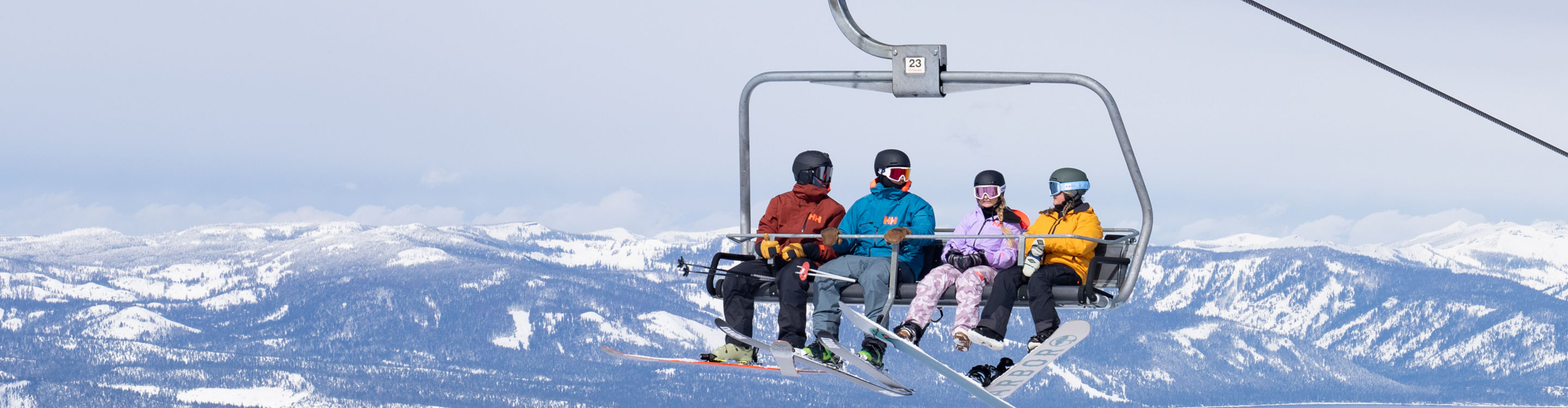 Group of Friends Ride Chairlift at Heavenly