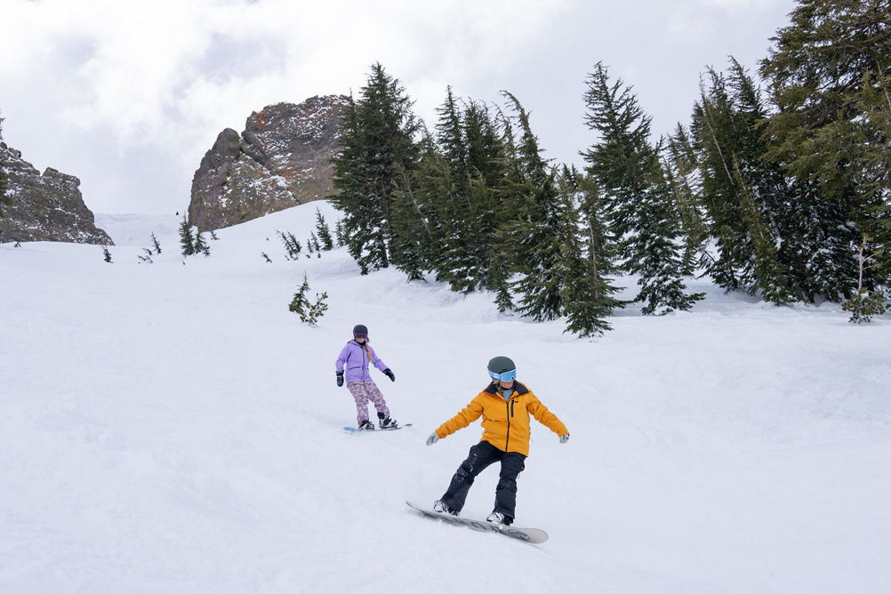 Women Snowboarding at Kirkwood