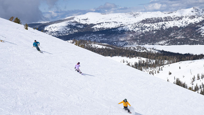 Group of Friends Skiing and Riding at Kirkwood