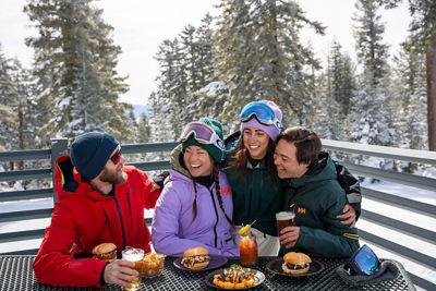Friends Enjoy Lunch and Drinks on Northstar Summit Smokehouse Deck