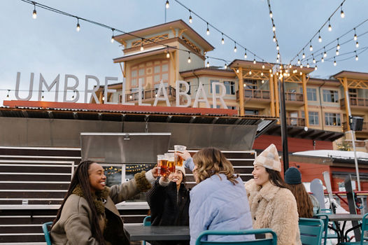Group of Women Cheers at Park City Umbrella Bar