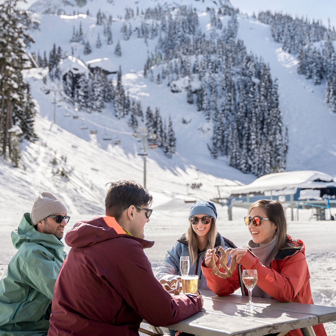 Couples Dine Outside at Whistler Blackcomb Glacier Creek Lodge