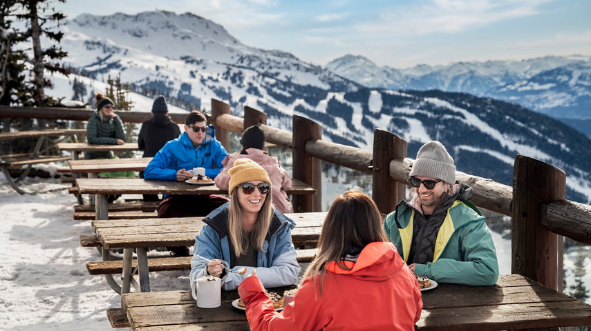 Couples Dine Outside at Whistler Blackcomb Crystal Hut