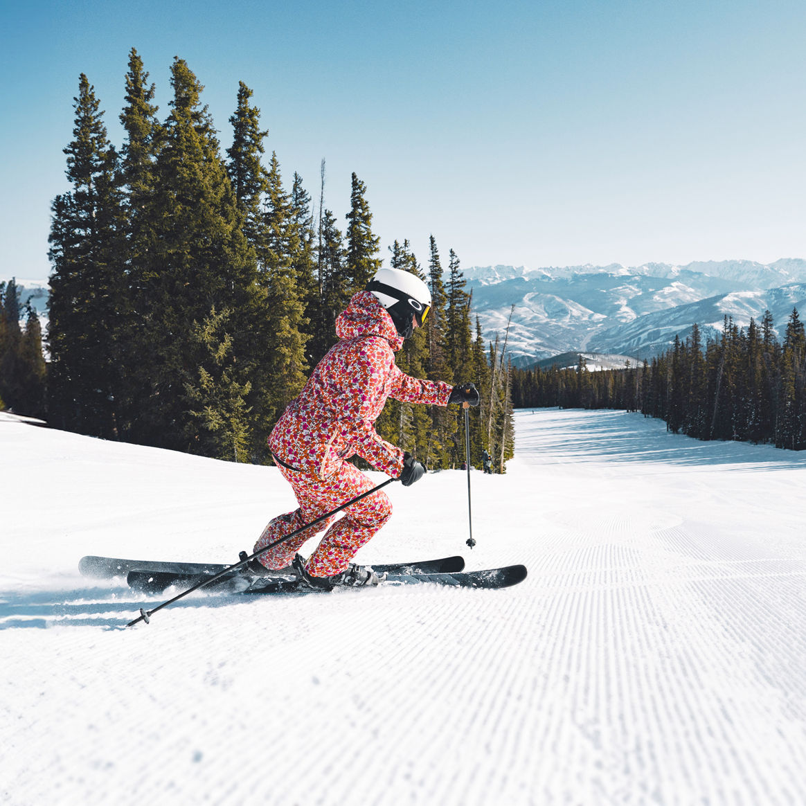 Woman Skiing Groomer at Top of Red Buffalo? - Color Treated