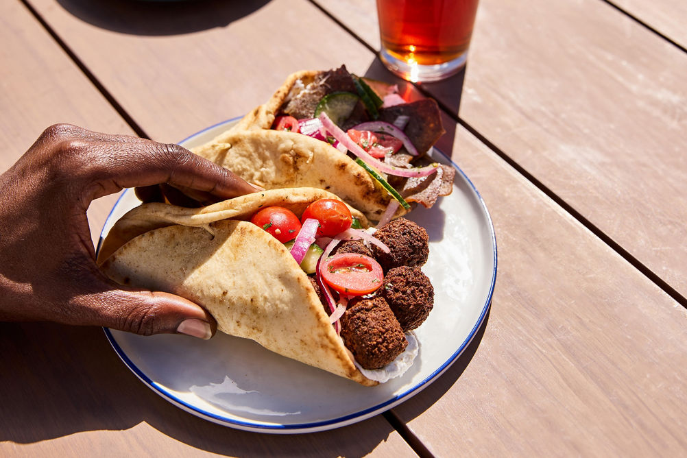 Friends Eat Lunch Outside at Breckenridge Vista Haus