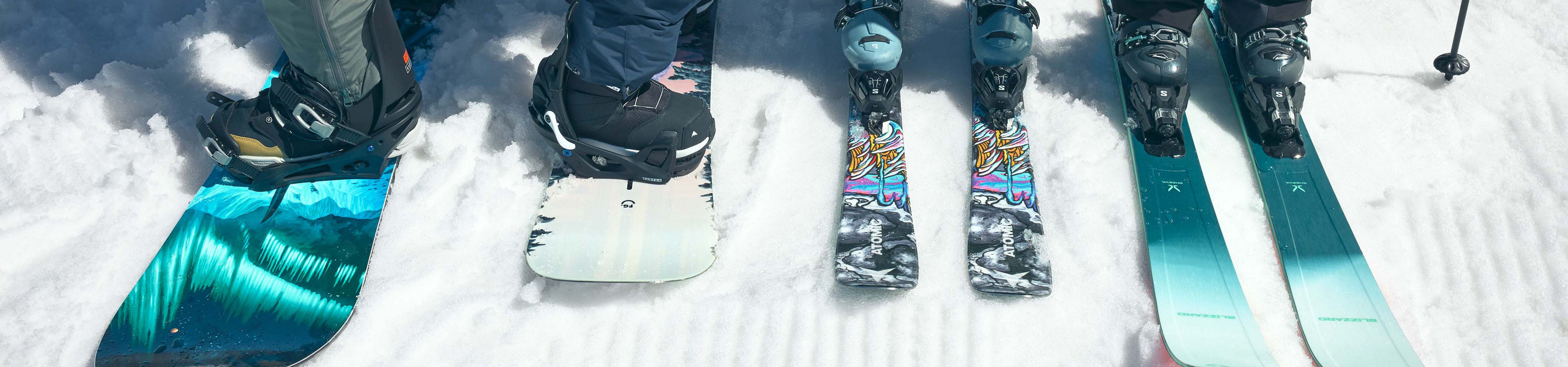 Guests Pose with Ski and Snowboard Gear on Groomed Snow at Beaver Creek