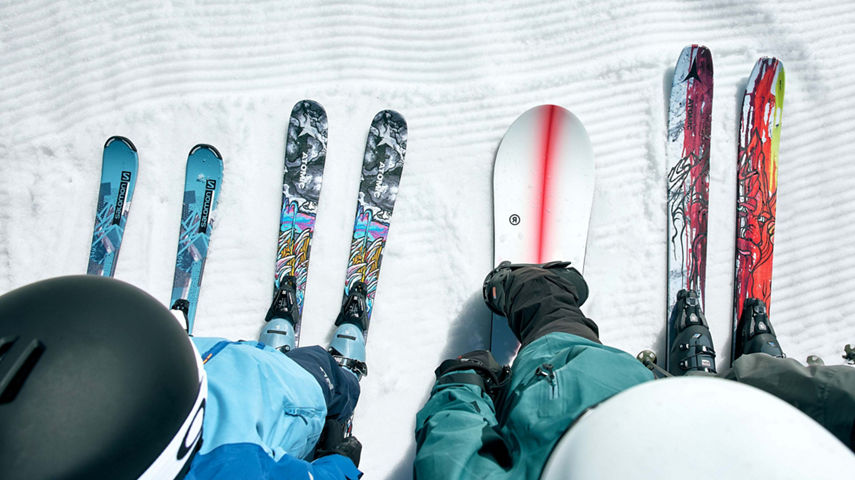 Guests Pose with Ski and Snowboard Gear on Groomed Snow at Beaver Creek