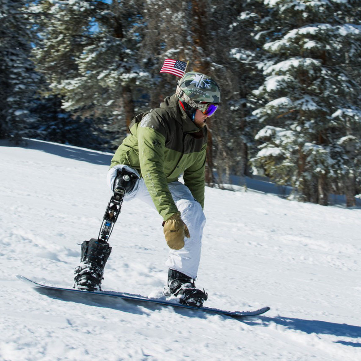 Adaptive Snowboarder in Vail Veterans Program