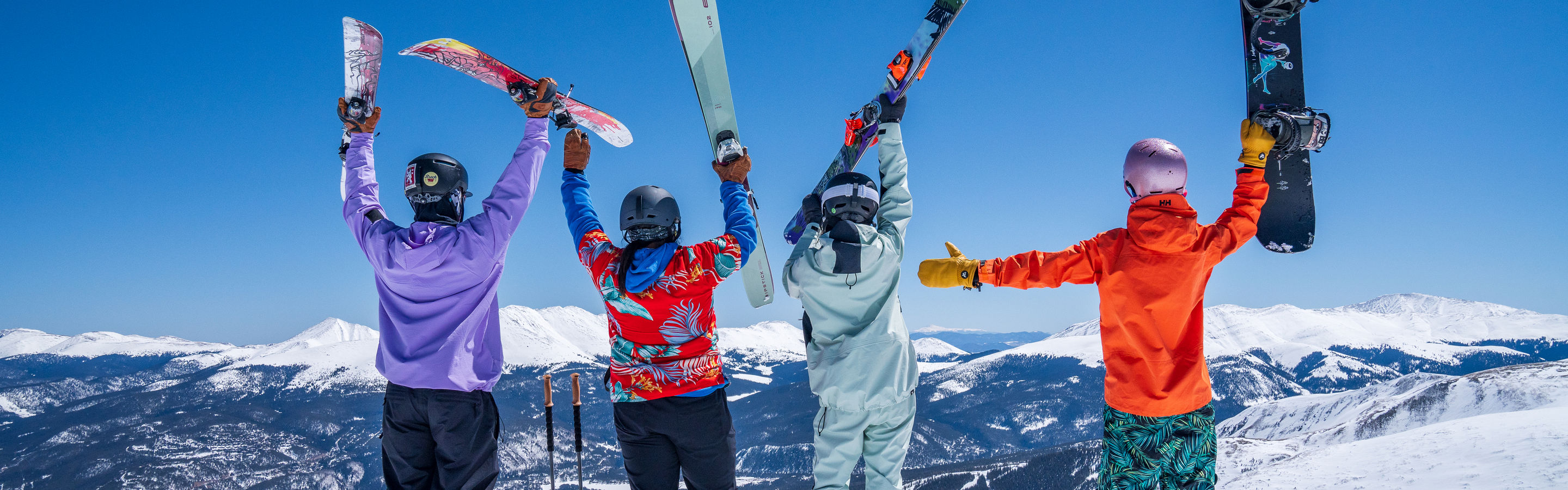 Group of Friends Celebrate at Top of Breckenridge Mountain