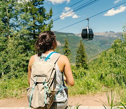 Woman Sitting taking in Scenery after a Summer Hike at Vail