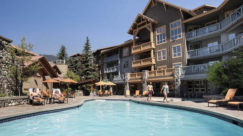 Friends Enjoying a Summer Pool Day at Whistler Blackcomb Legends