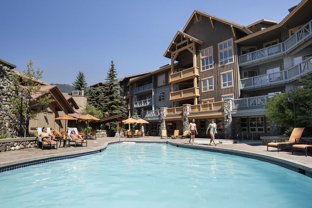 Friends Enjoying a Summer Pool Day at Whistler Blackcomb Legends