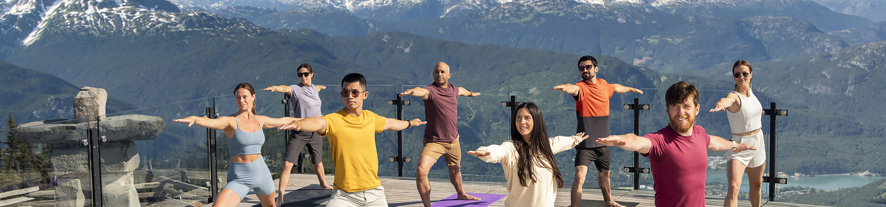 Group of Friends Practicing Yoga at Whistler Blackcomb