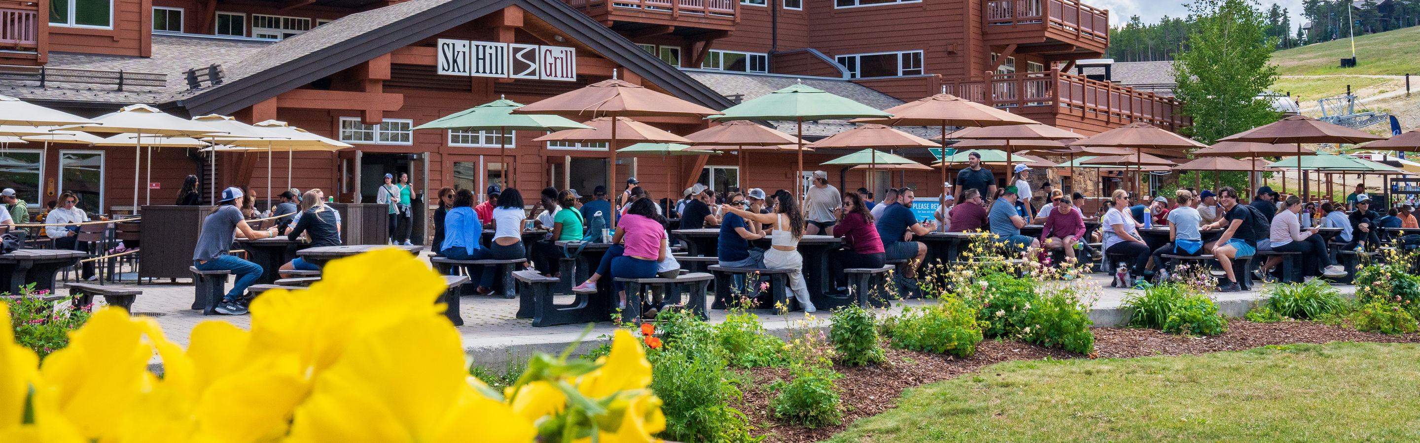 Resort Guests Dining at Ski Hill Grill Outdoor Patio