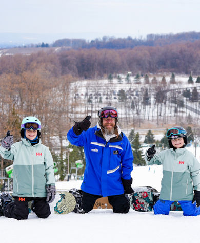 Ski Ride School Instructor and Participants Thumbs Up at Roundtop