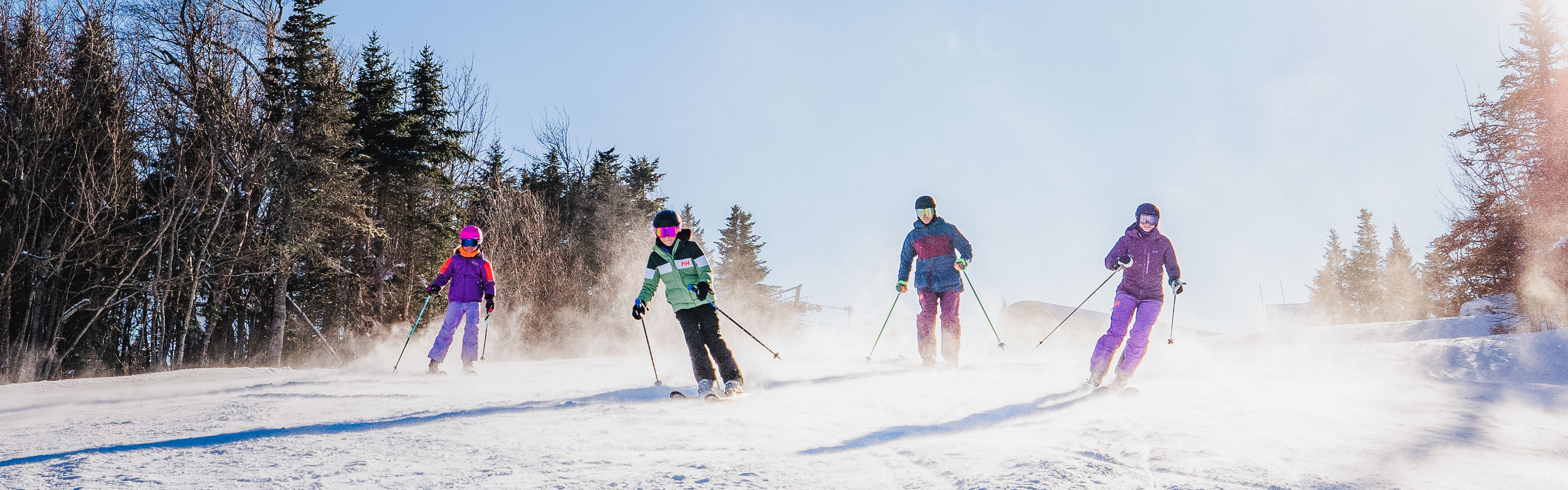 Family Skis Down Trail at Okemo