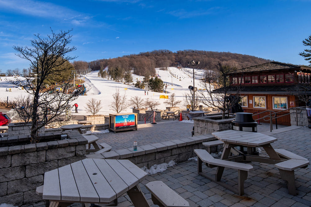 Outdoor Picnic Tables at Alpine Lodge