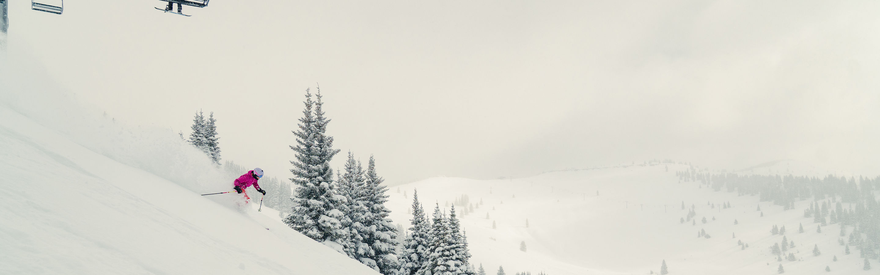 Skier Deep in Powder at Vail