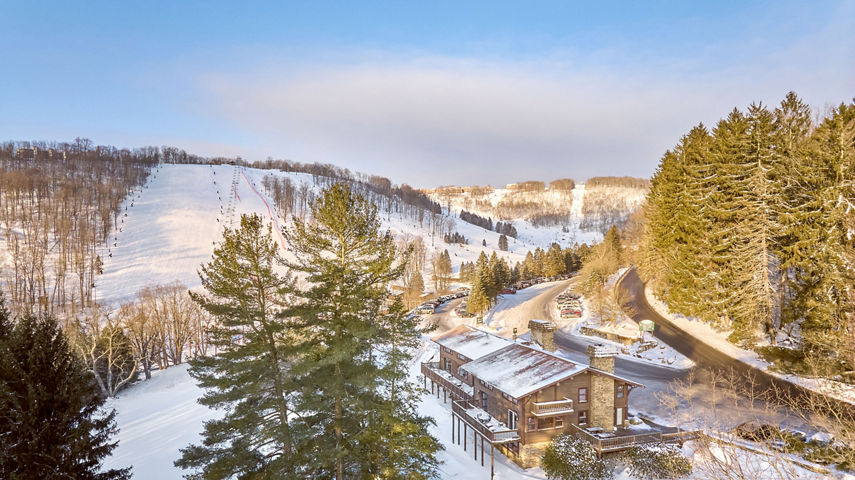 Snowy Exterior of Birch Chalets at Seven Springs