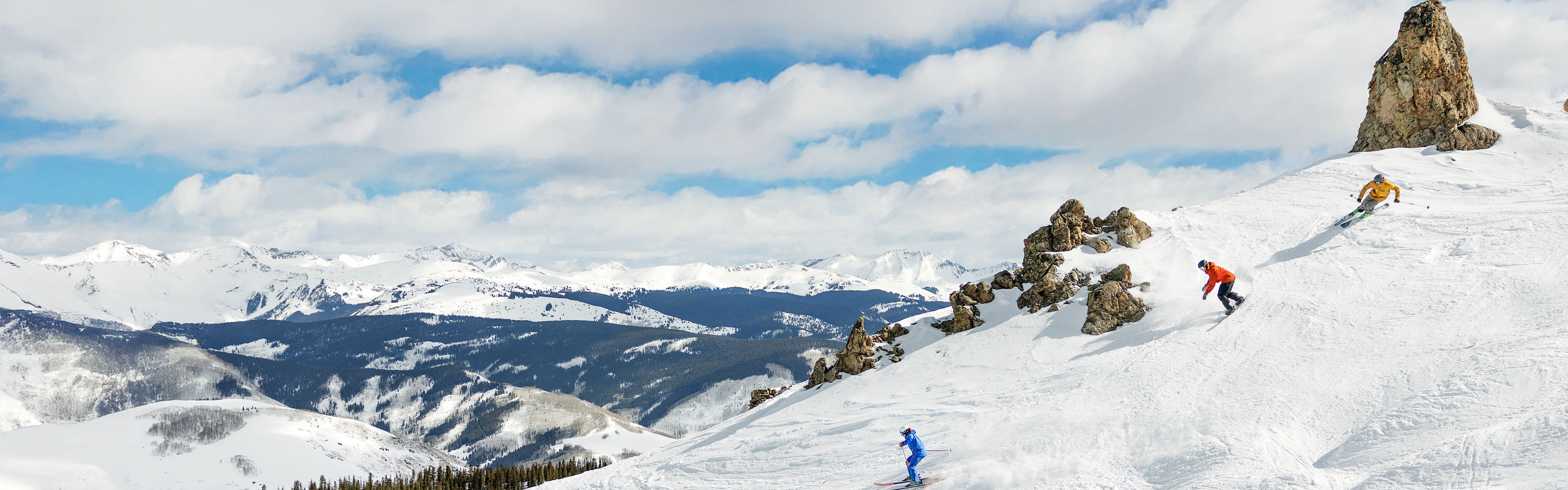 Group of Friends Skiing and Riding at Crested Butte