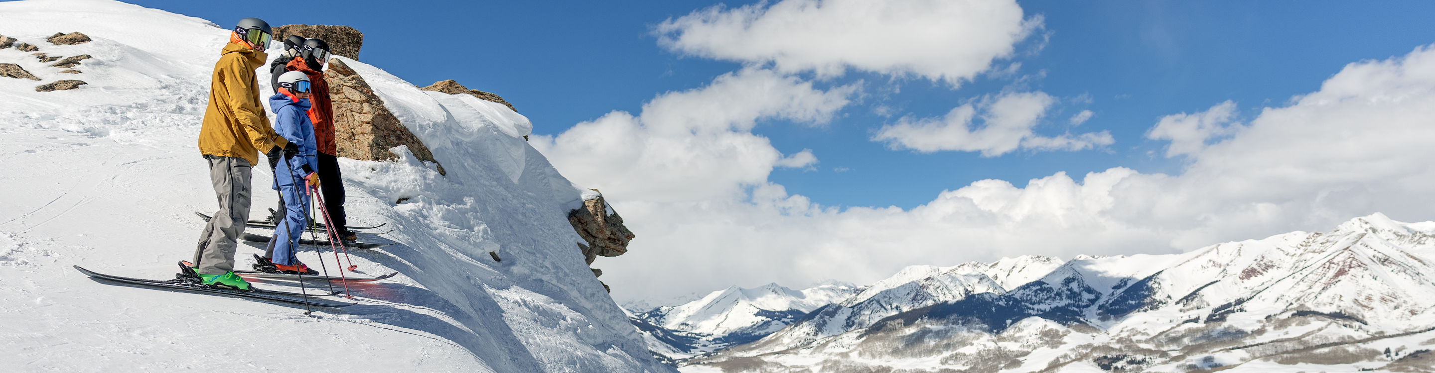Friends Taking In Scenic Mountainscape While Skiing at Crested Butte