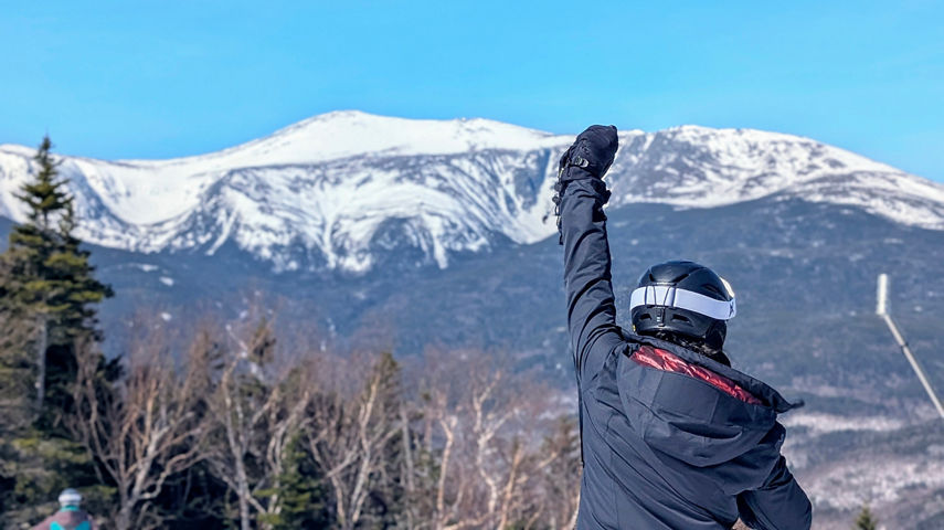 Woman Looks Out at Scenic Wildcat Mountain
