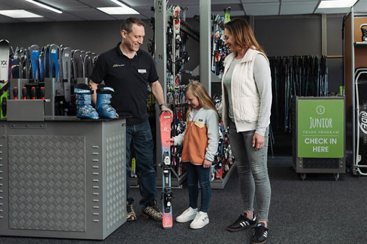 Epic Mountain Gear Employee Assisting Customers with Gear Selection at Boulder Location