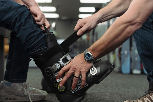 Epic Mountain Gear Employee Assisting Customer with Rentals at Boulder Location