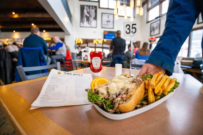 Cheesesteak and Fries at Bull Restaurant & Bar
