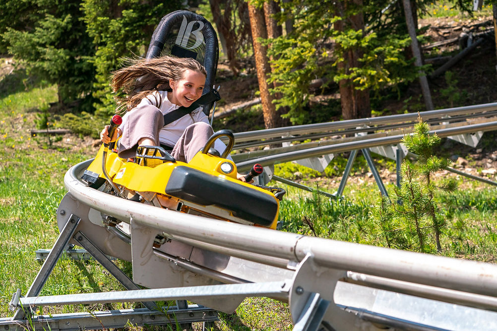 Girl Riding  Gold Runner Alpine Coaster at Breckenridge