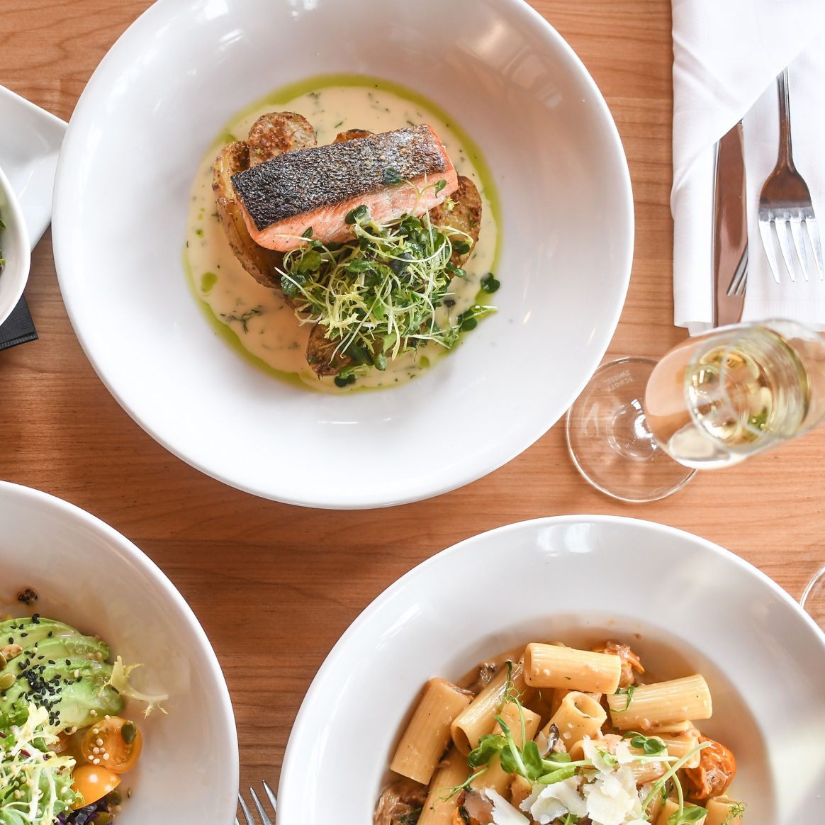 Pasta Plate, Salmon Plate, Salad Plate, and Pork Sandwich Plate from Steep's Grill and Wine Bar