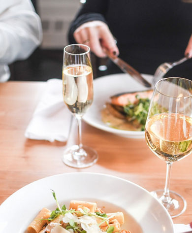 Pasta Plate and Glass of Wine and Champagne at Steep's Grill and Wine Bar