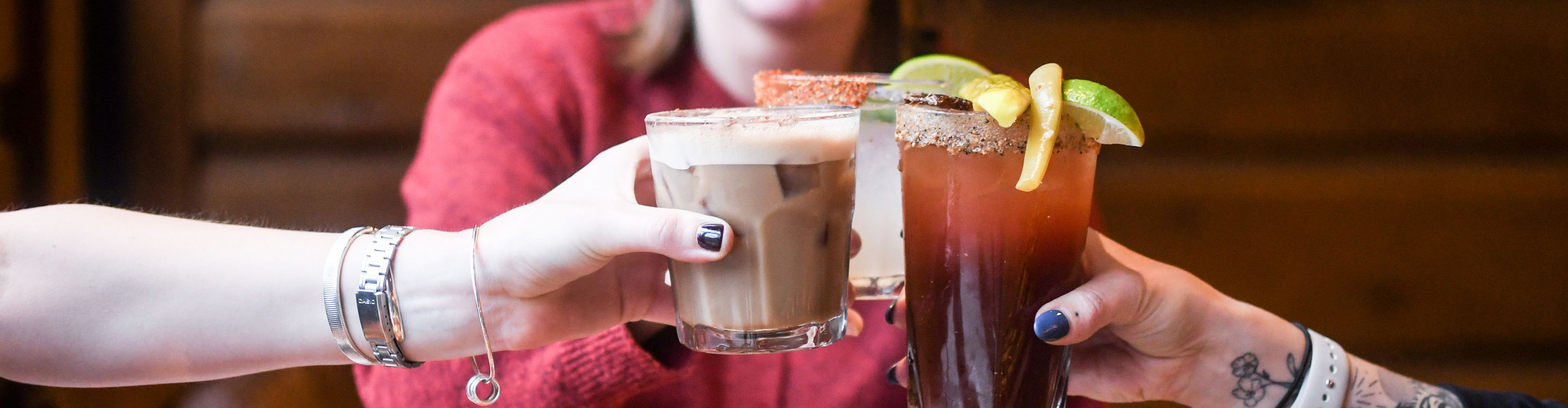Group of Friends Cheersing at Dusty's Bar and BBQ