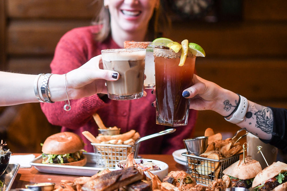 Group of Friends Cheersing at Dusty's Bar and BBQ