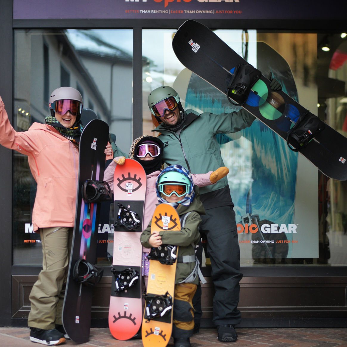 Family Posing with Snowboard Gear in Front of My Epic Gear Storefront | Carousel Whitelisting