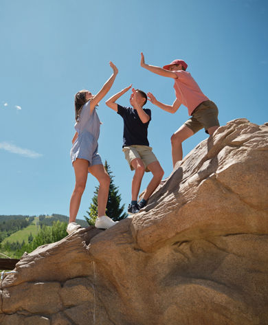 Kids High-Fiving at Beaver Creek Adventure Center