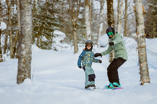 Mom and Son Snowboarding at Stoneham