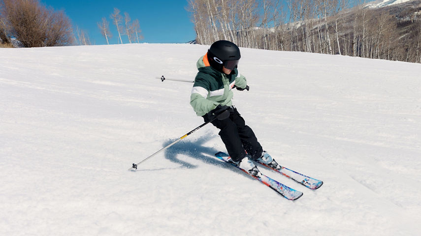 Youth Skier Carving Fresh Turns