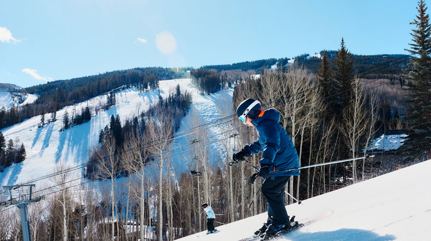 Boy Cruising Sunny Slopes with My Epic Gear Skis at Beaver Creek