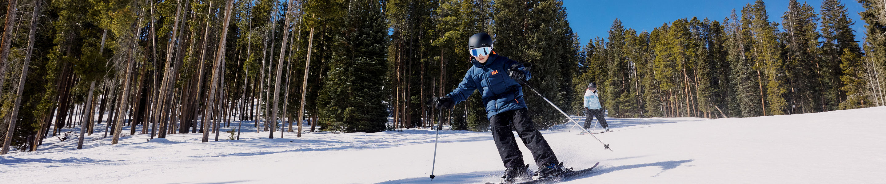 Boy Carving Fast on Sunny Beaver Creek Groomers