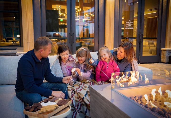 Family Roasting Marshmallows at Kindred Resort