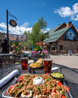 Loaded Nachos Appetizer and Beer at Keystone 9280 Restaurant Patio