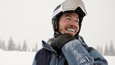 Close Up of Shaun White Smiling Away From Camera in Snowy Park City
