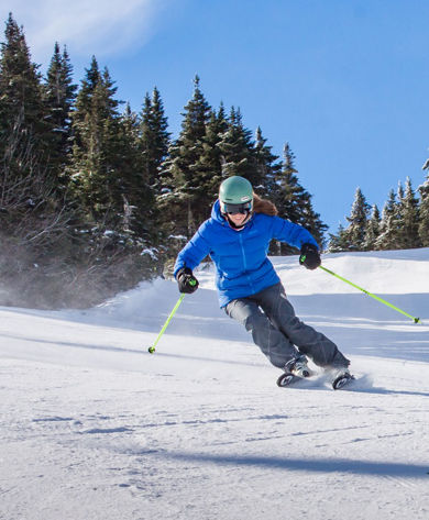 Skier Makes Turns Under the Chairlift at Mount Snow