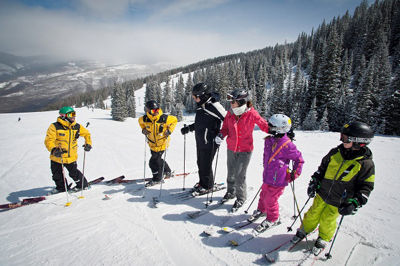 skiers assessing the terrain