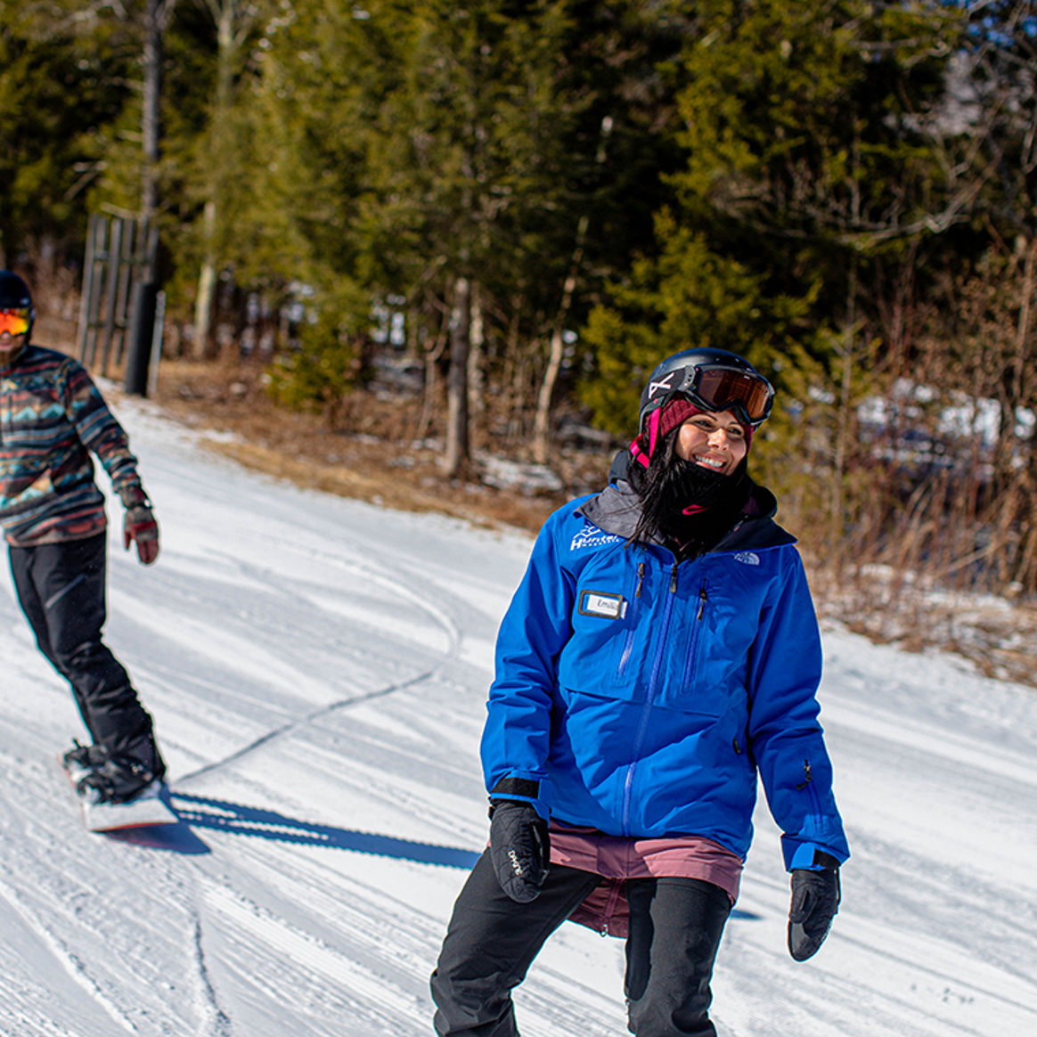 Adult snowboard down slope