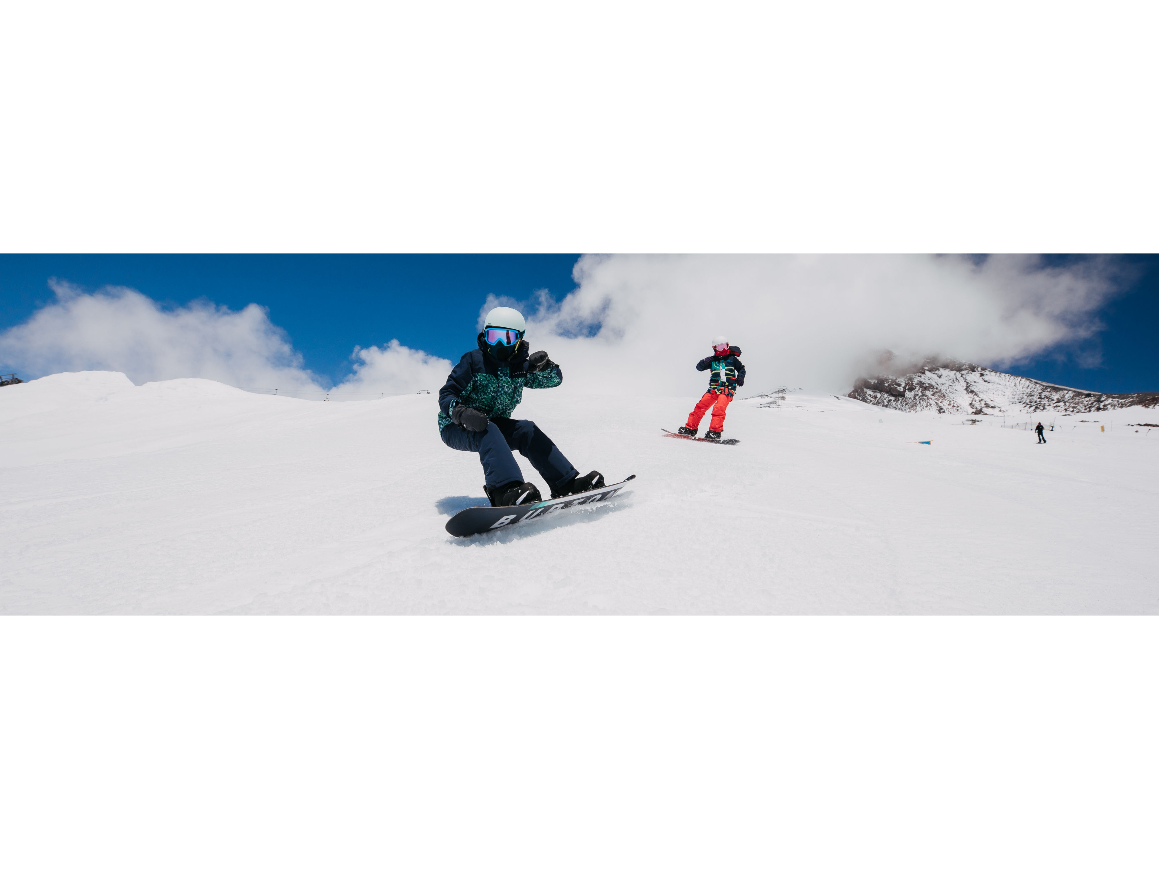 Two Burton Snowboarders