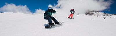 Two Burton Snowboarders