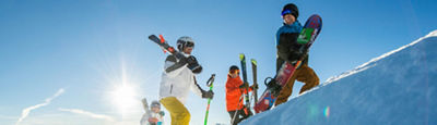 Uphill travel partner skiing in back bowls on a powder day in Vail, Colorado