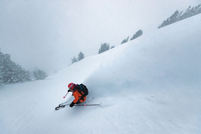 Skier skiing down mountain wearing Patagonia gear
